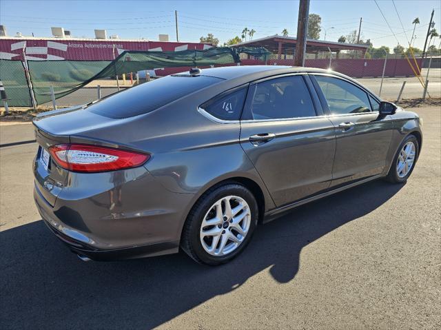 used 2015 Ford Fusion car, priced at $6,988