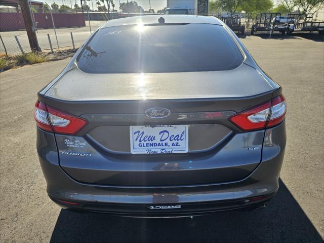 used 2015 Ford Fusion car, priced at $6,988