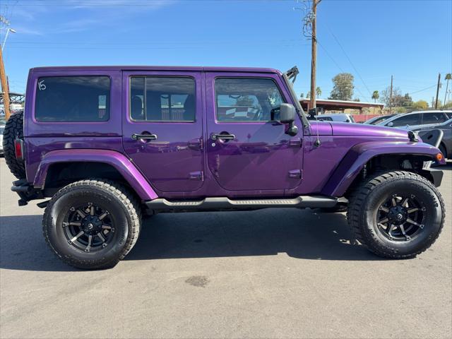 used 2012 Jeep Wrangler Unlimited car, priced at $16,988