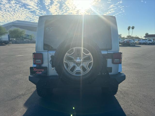 used 2012 Jeep Wrangler Unlimited car, priced at $15,988