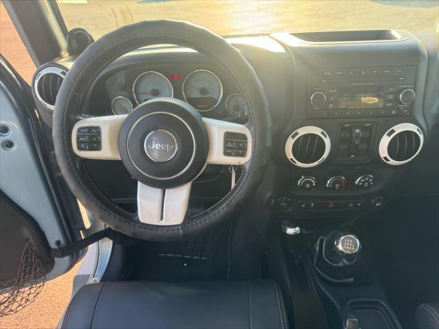 used 2012 Jeep Wrangler Unlimited car, priced at $15,988