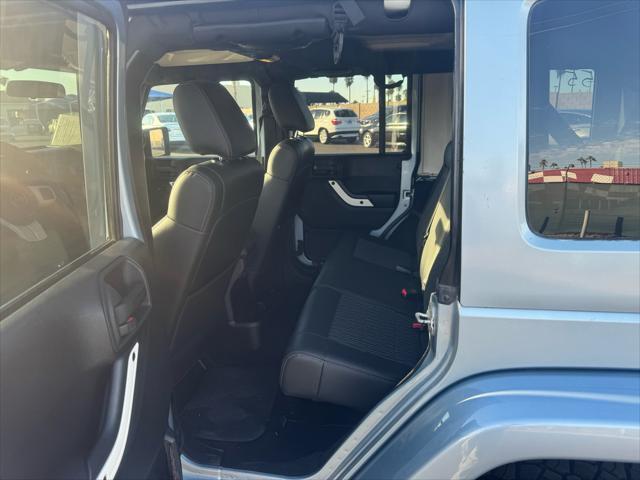 used 2012 Jeep Wrangler Unlimited car, priced at $15,988