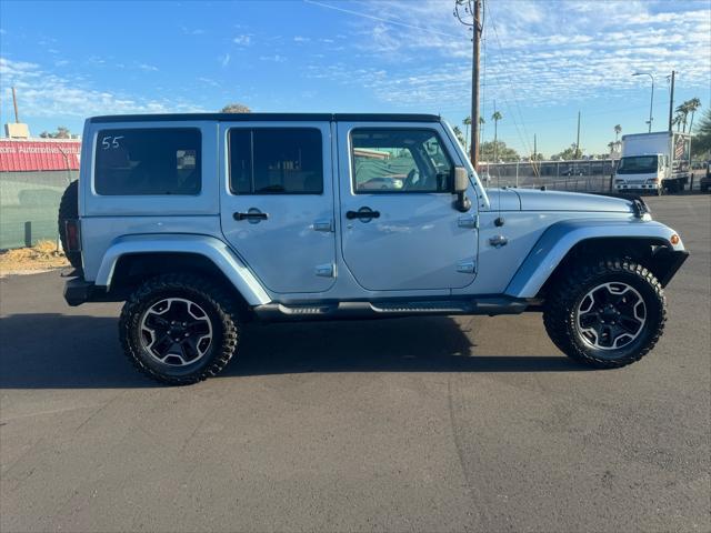 used 2012 Jeep Wrangler Unlimited car, priced at $15,988