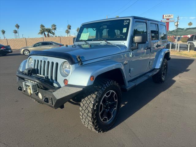 used 2012 Jeep Wrangler Unlimited car, priced at $15,988