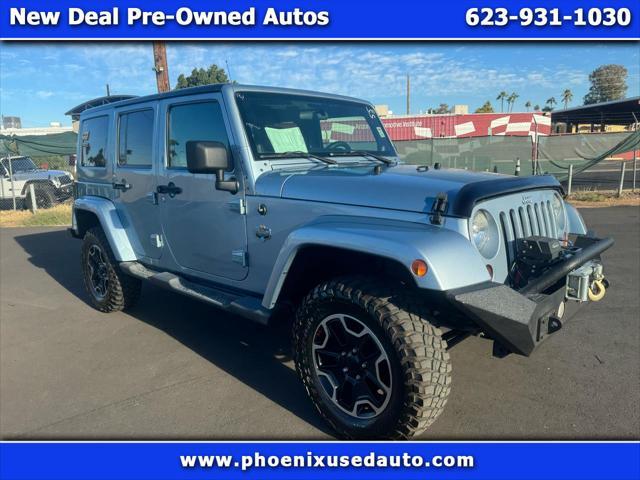 used 2012 Jeep Wrangler Unlimited car, priced at $15,988