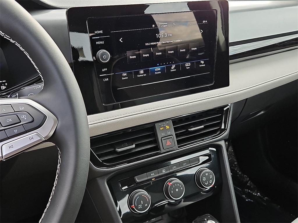 new 2025 Volkswagen Taos car, priced at $27,521