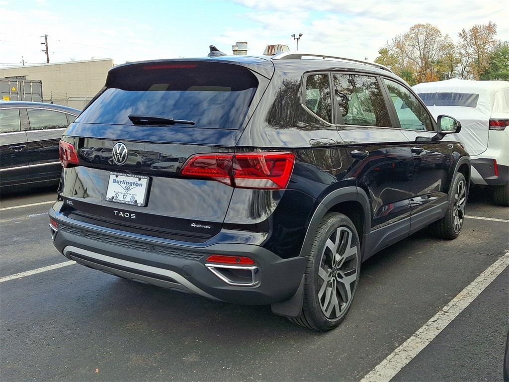 used 2023 Volkswagen Taos car, priced at $23,183
