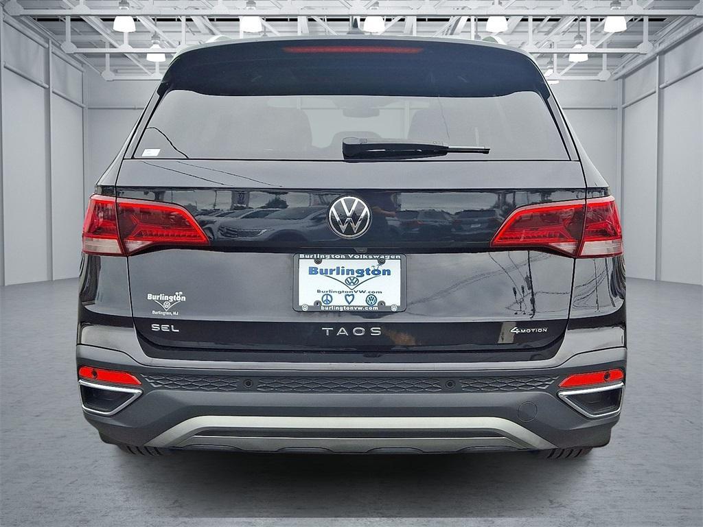 used 2023 Volkswagen Taos car, priced at $25,561