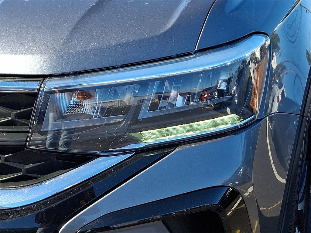 used 2022 Volkswagen Taos car, priced at $21,211