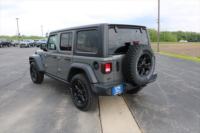 used 2020 Jeep Wrangler Unlimited car, priced at $31,584