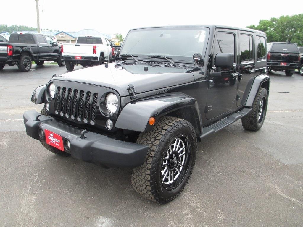 used 2014 Jeep Wrangler Unlimited car, priced at $18,495