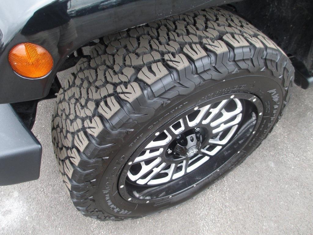 used 2014 Jeep Wrangler Unlimited car, priced at $18,495