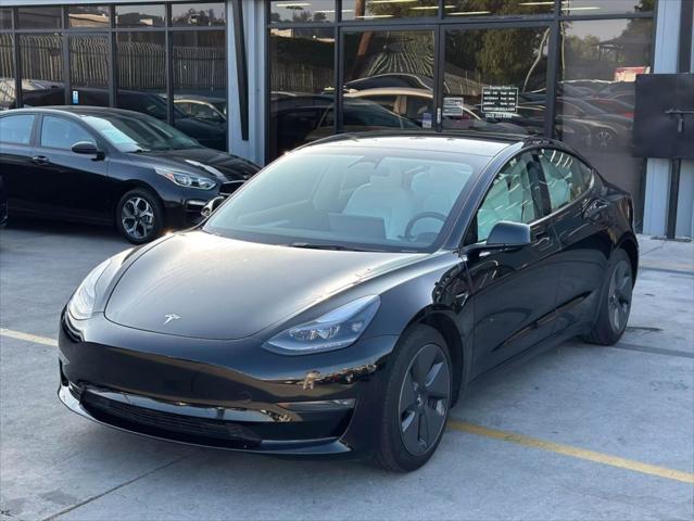 used 2023 Tesla Model 3 car, priced at $20,995