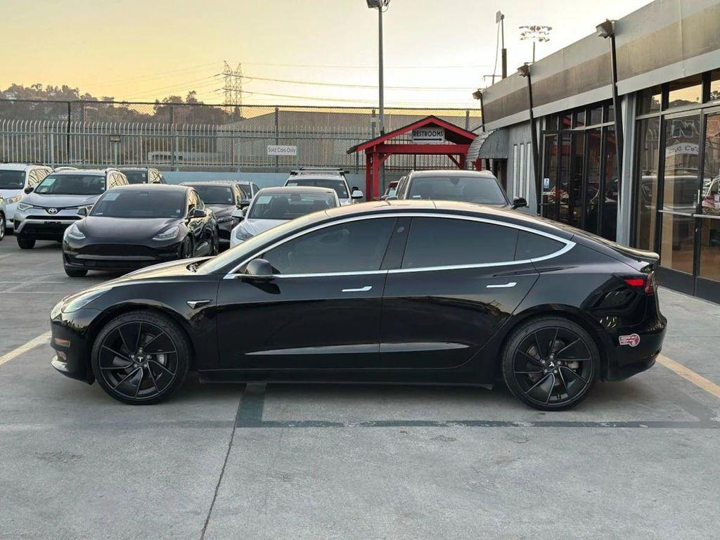 used 2018 Tesla Model 3 car, priced at $13,995