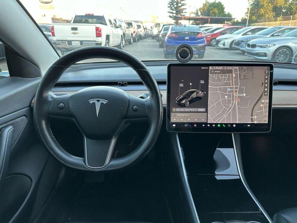 used 2018 Tesla Model 3 car, priced at $13,995