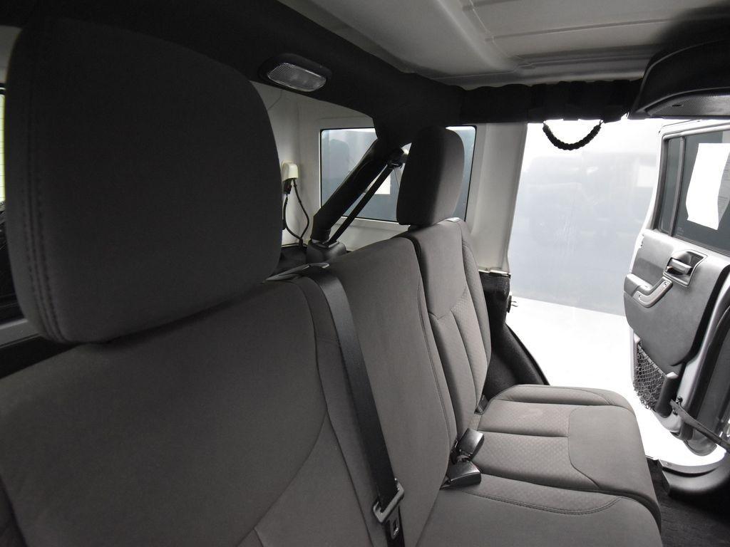 used 2018 Jeep Wrangler JK Unlimited car, priced at $19,300