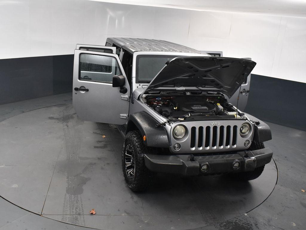 used 2018 Jeep Wrangler JK Unlimited car, priced at $19,300