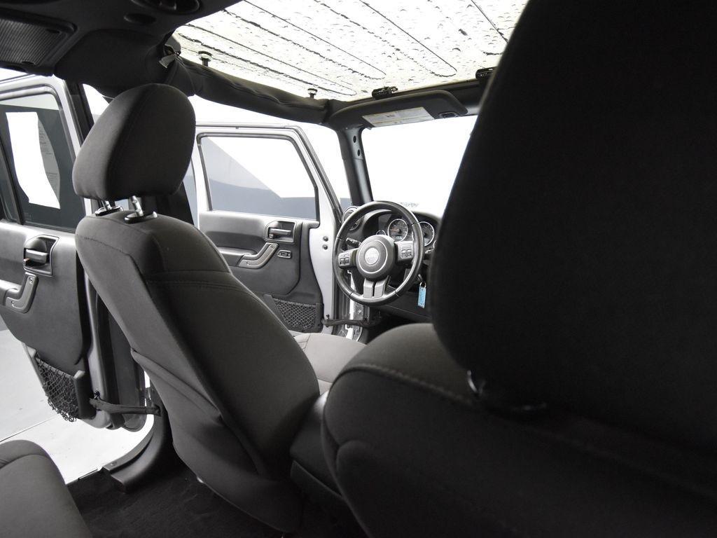 used 2018 Jeep Wrangler JK Unlimited car, priced at $19,300