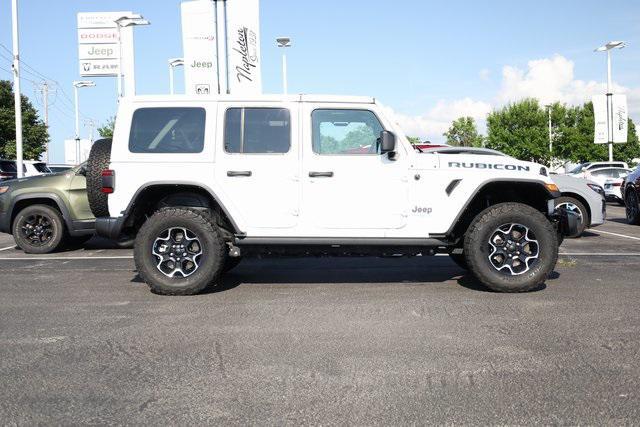 used 2022 Jeep Wrangler Unlimited 4xe car, priced at $33,808