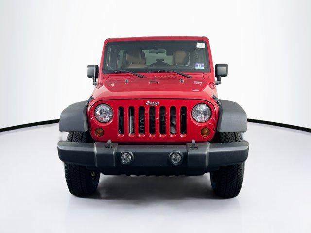 used 2011 Jeep Wrangler Unlimited car, priced at $16,995
