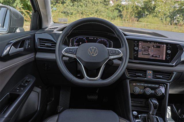 used 2022 Volkswagen Taos car, priced at $21,000