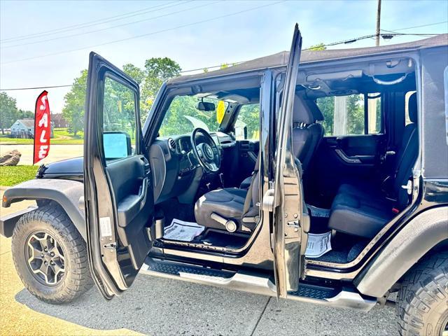 used 2013 Jeep Wrangler Unlimited car, priced at $14,900