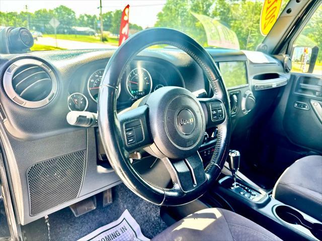 used 2013 Jeep Wrangler Unlimited car, priced at $14,900