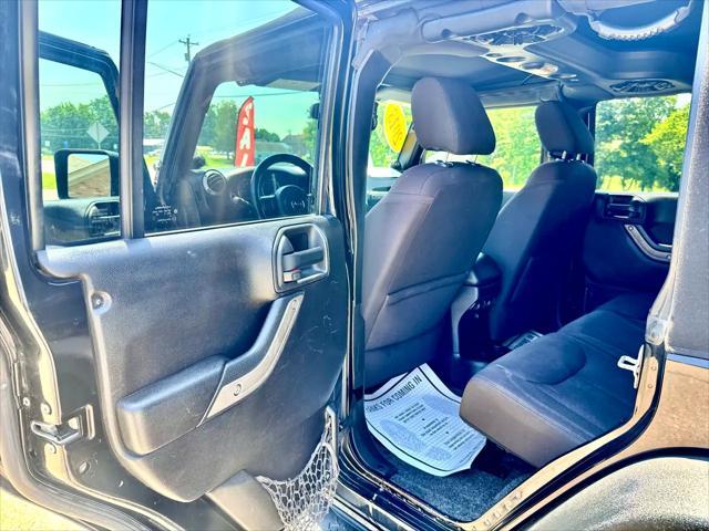 used 2013 Jeep Wrangler Unlimited car, priced at $14,900