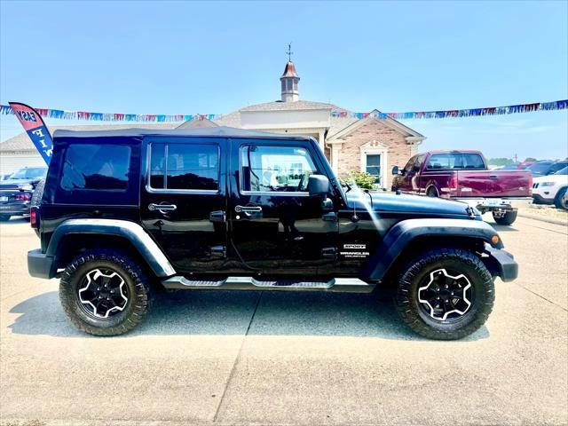 used 2013 Jeep Wrangler Unlimited car, priced at $14,900