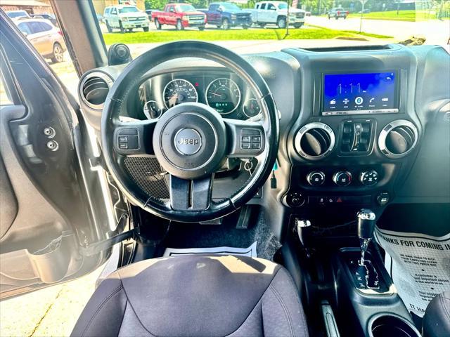 used 2013 Jeep Wrangler Unlimited car, priced at $14,900