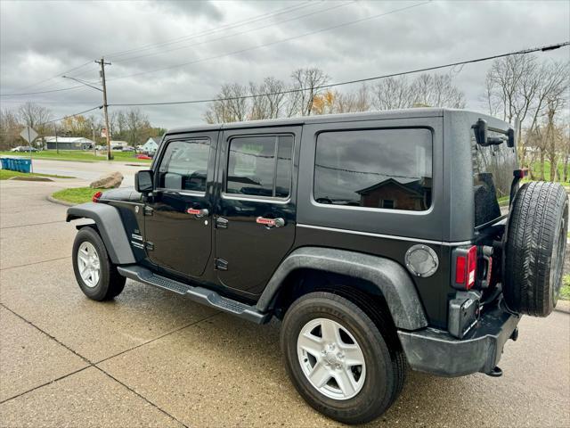 used 2014 Jeep Wrangler Unlimited car, priced at $15,500