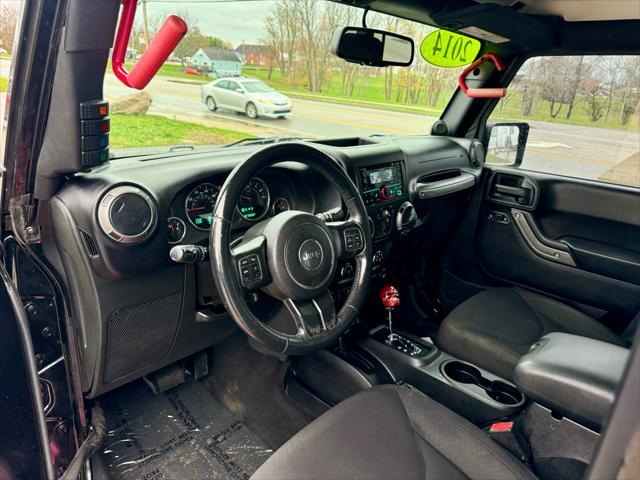 used 2014 Jeep Wrangler Unlimited car, priced at $15,500