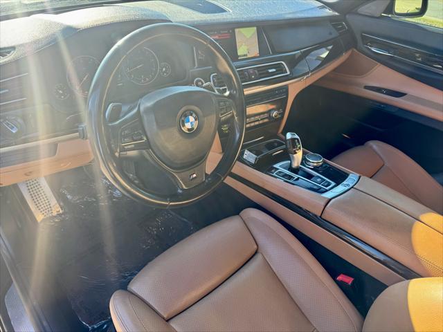 used 2015 BMW 750 car, priced at $15,900