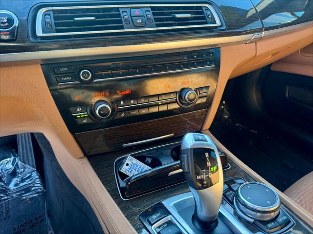 used 2015 BMW 750 car, priced at $15,900