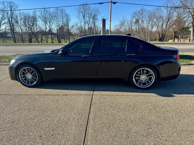 used 2015 BMW 750 car, priced at $15,900