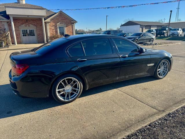 used 2015 BMW 750 car, priced at $15,900