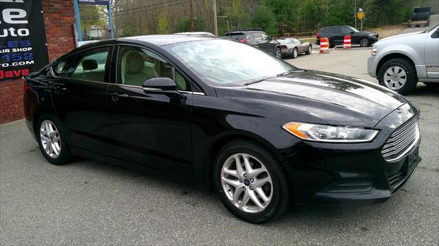 used 2016 Ford Fusion car, priced at $10,990