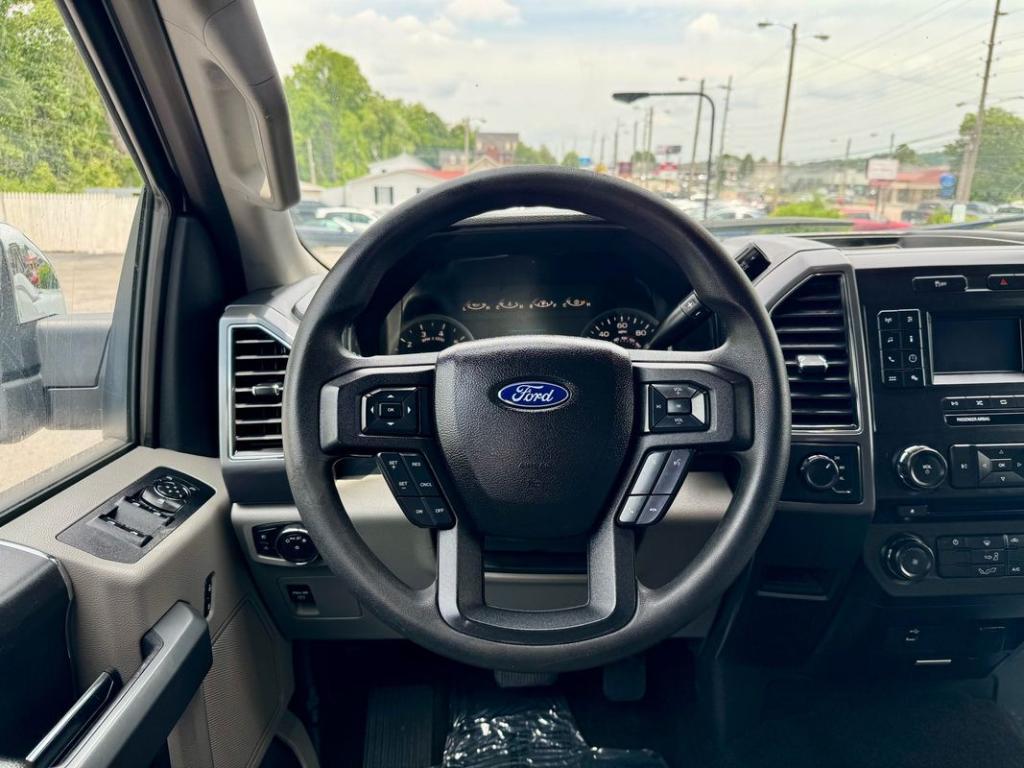 used 2018 Ford F-150 car, priced at $18,999