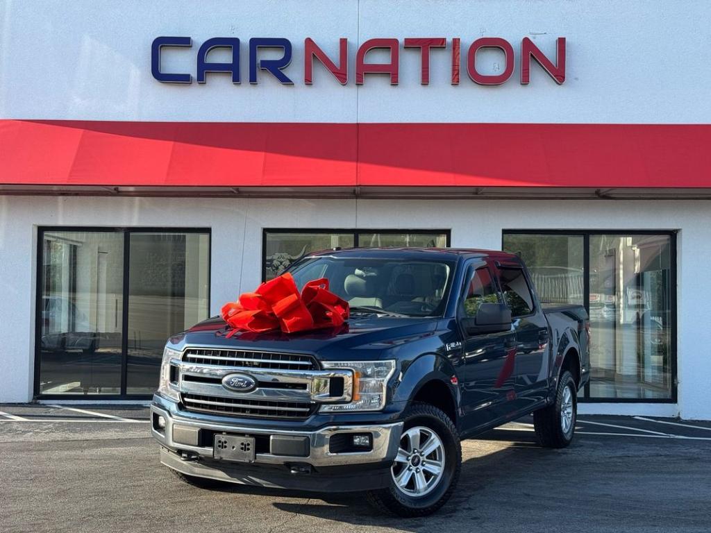 used 2018 Ford F-150 car, priced at $17,700