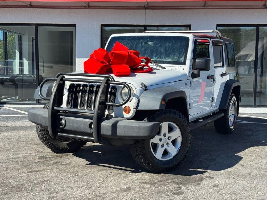 used 2013 Jeep Wrangler Unlimited car, priced at $8,999