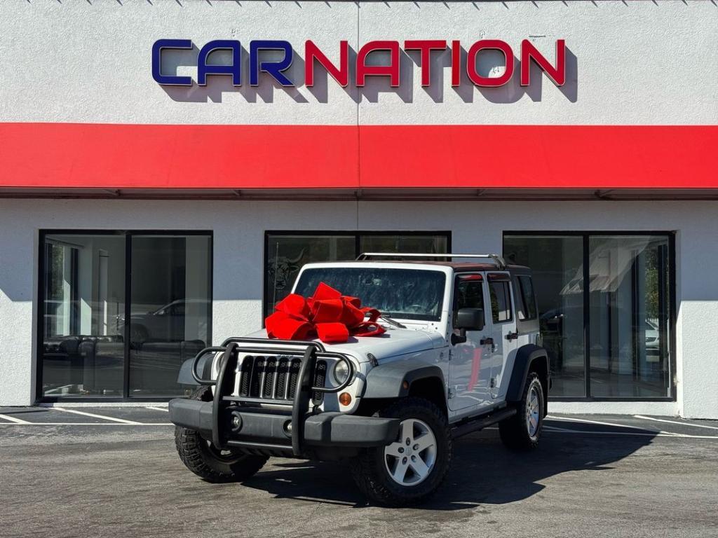 used 2013 Jeep Wrangler Unlimited car, priced at $8,999