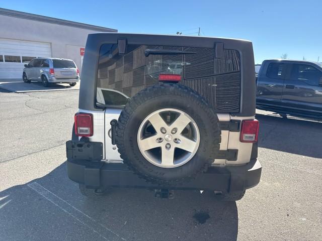 used 2011 Jeep Wrangler Unlimited car, priced at $13,977