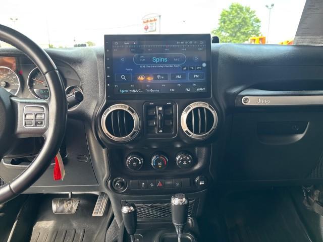 used 2017 Jeep Wrangler Unlimited car, priced at $27,399