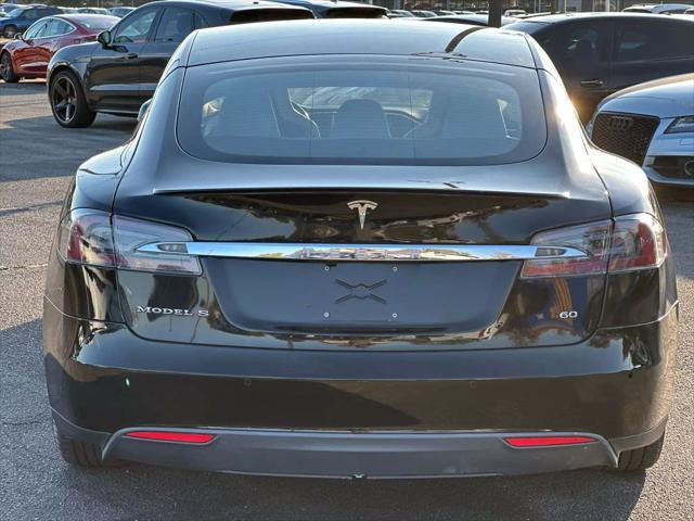 used 2015 Tesla Model S car, priced at $14,900