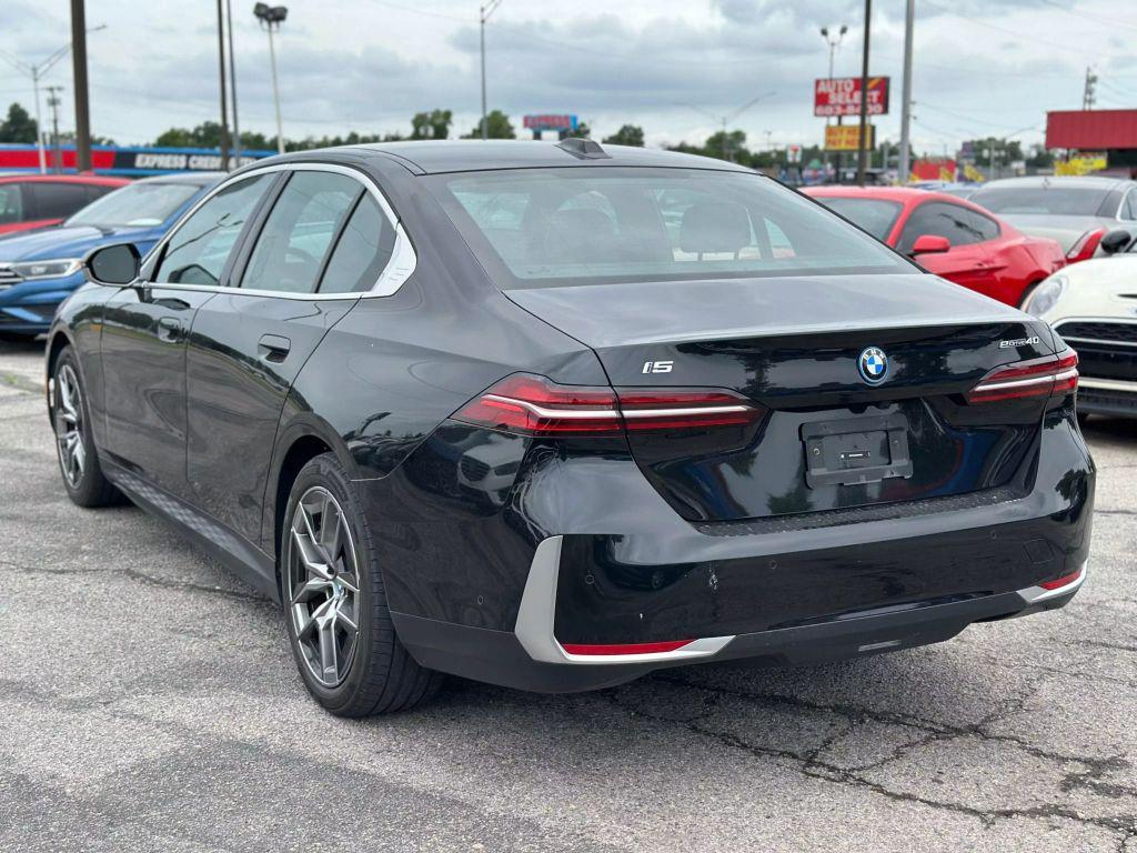 used 2024 BMW i5 car, priced at $47,900