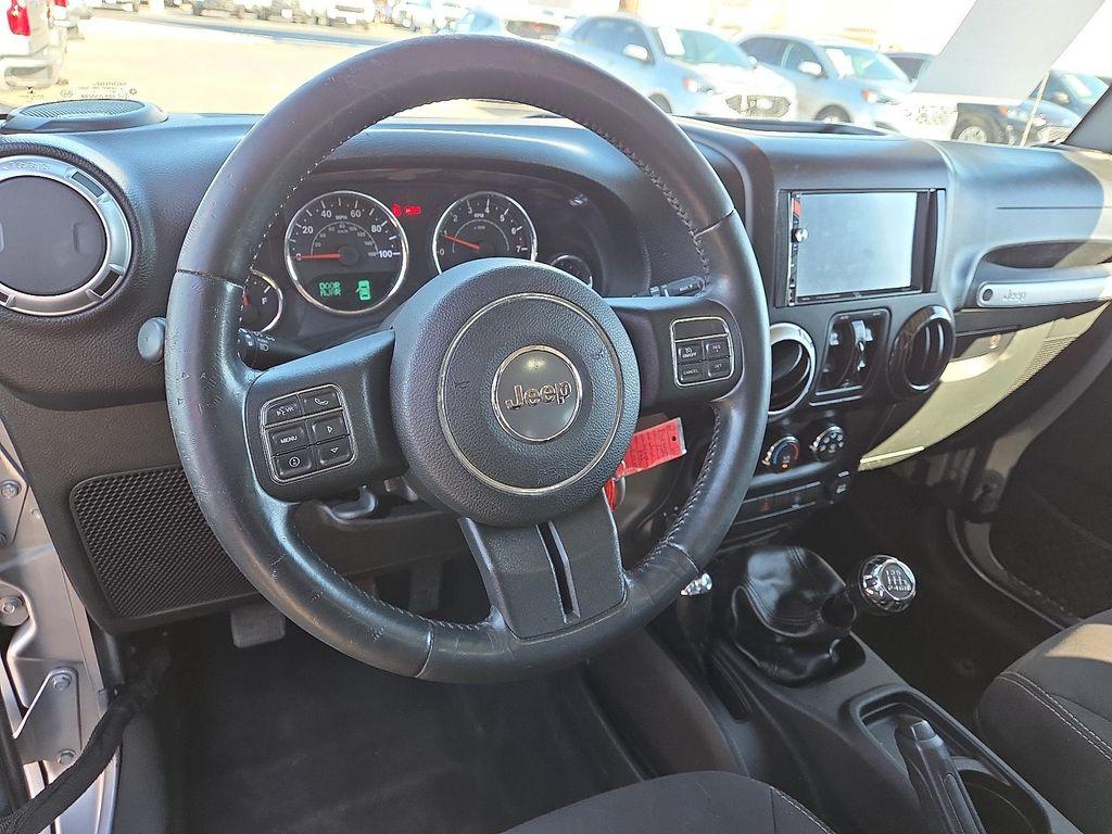 used 2015 Jeep Wrangler Unlimited car, priced at $19,995