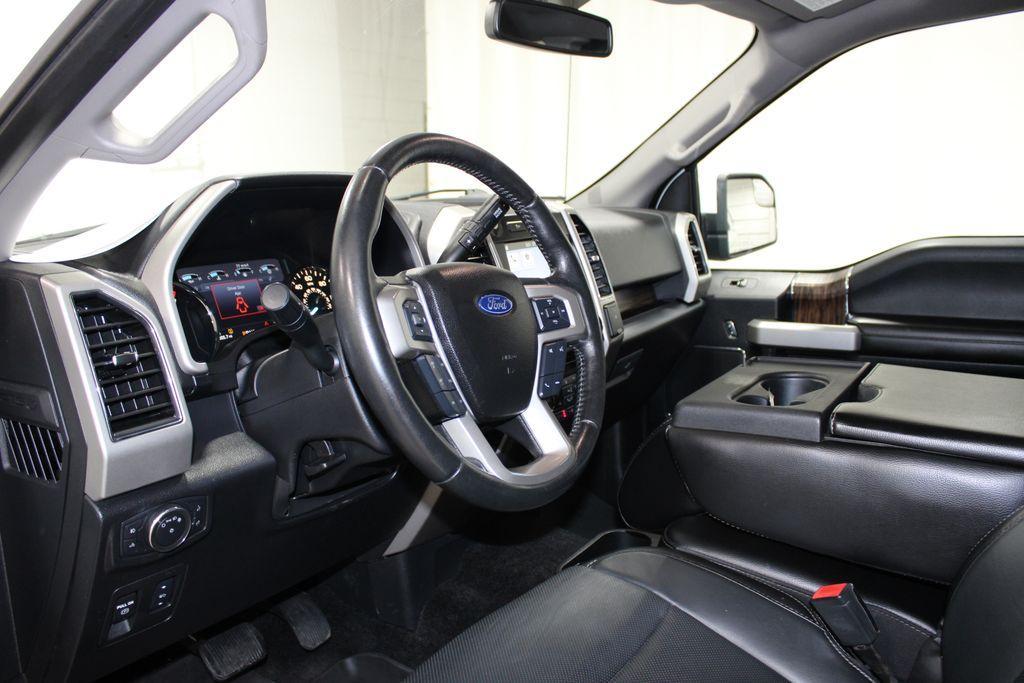 used 2018 Ford F-150 car, priced at $23,209