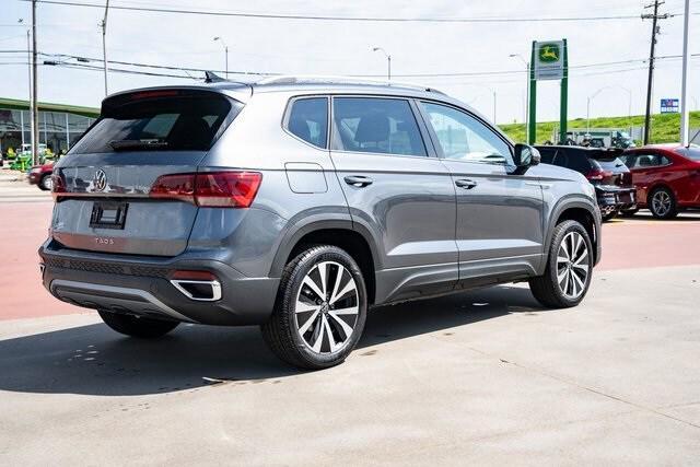 new 2024 Volkswagen Taos car, priced at $28,658