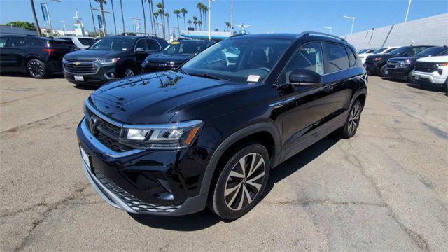 used 2024 Volkswagen Taos car, priced at $20,875