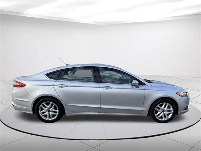 used 2014 Ford Fusion car, priced at $8,999